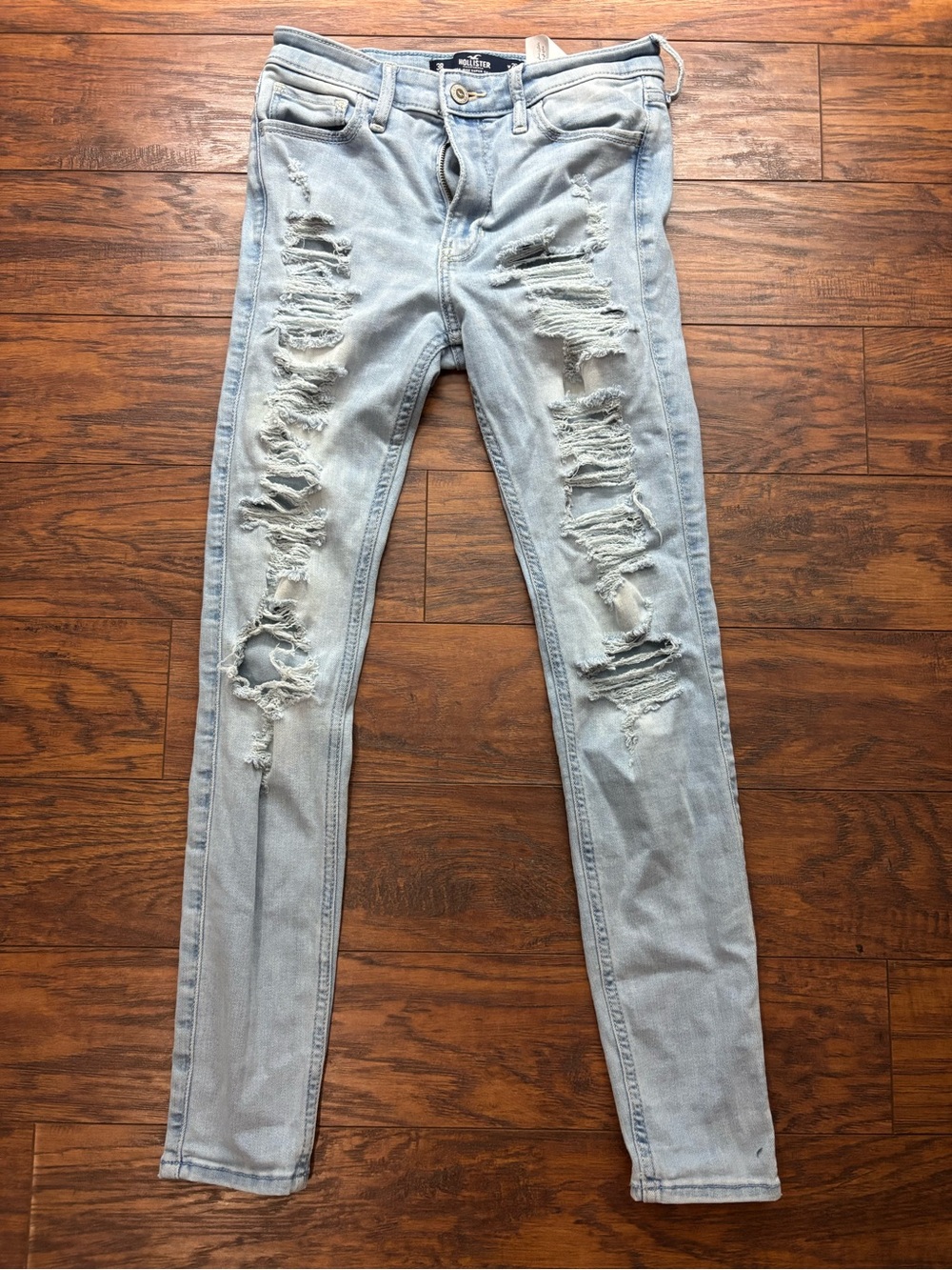 Hollister Light Blue Skinny Jeans with rips and Curved Back Stitching size 3